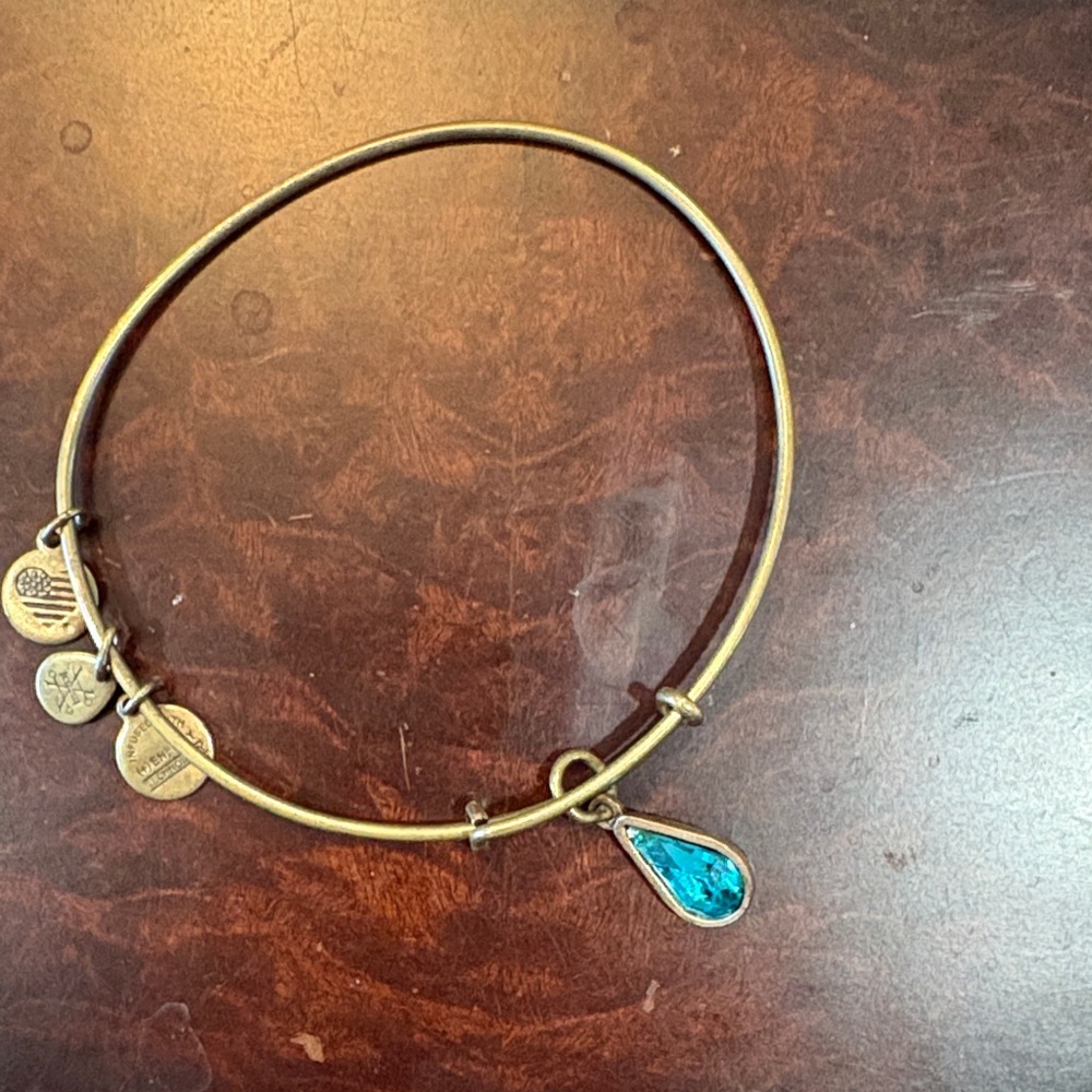 Alex and Ani Gold Bracelet with Blue Charm